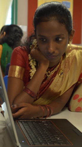 Sweety demonstrates classic South Indian style whilst using her laptop!